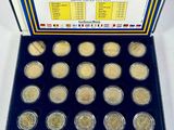 a box of coins that are sitting on a table