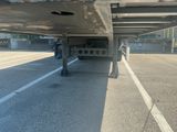 a truck that is parked on the side of the road
