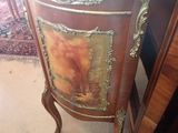 a table with a marble top in a room
