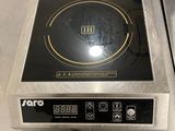 an image of a stove top with a black burner on it