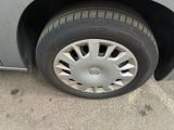 a close up of a tire on a car ' s rim