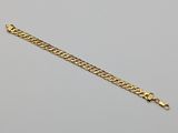 a gold chain bracelet with a clasp on a white background