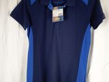 a blue and blue polo shirt hanging on a hanger