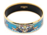 an image of a bracelet with a blue and gold design on it