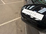 a sticker on the side mirror of a car
