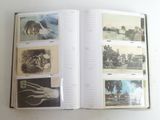 an open book with pictures of people and animals on it