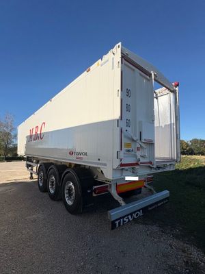 an image of a semi trailer parked on the side of the road