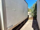 a truck that is parked on the side of the road