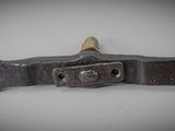 a close up of a belt buckle on a white surface