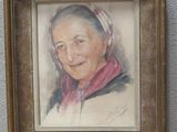 tableau représentant une femme portant un foulard rouge, dans un cadre en bois