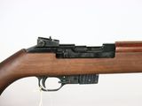 a close up of a rifle on a white background
