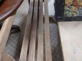 several pieces of wood are stacked on top of a wooden table