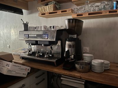 a coffee machine sitting on a counter in a kitchen