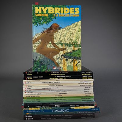 books stacked on top of each other on a gray surface