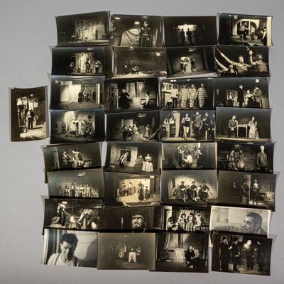 several old black and white photographs of people on a wall