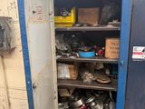 a metal cabinet with many items inside of it