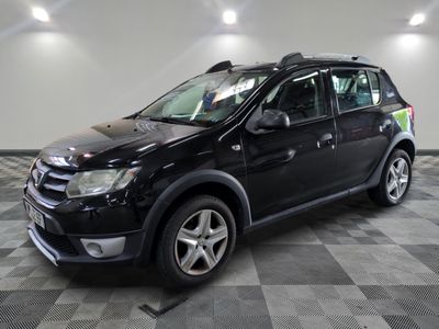 a picture of a black suv parked in a garage