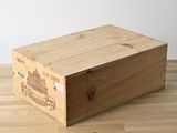 a wooden box that is sitting on a wooden floor
