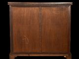 an image of a wooden cabinet with two doors and a number on the front