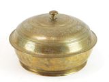 brass plate with lid on a white background