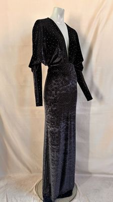 black and silver velvet evening gown on mannequin base