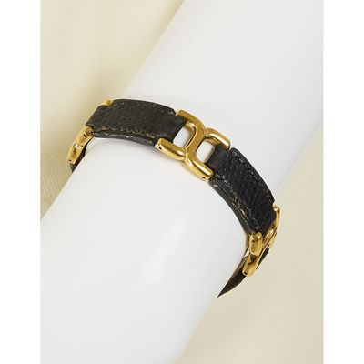 HERMÈS, Bracelet en cuir noir embossé façon lézard et métal …