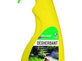 un vaporisateur jaune avec une poignée verte sur fond blanc