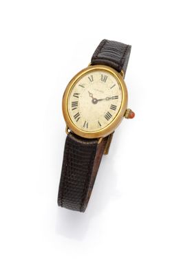 a close up of a wrist watch with roman numerals on it