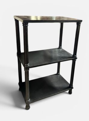 a black shelf with a metal top on a white background