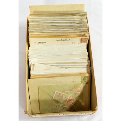 a box filled with lots of mail sitting on top of a table