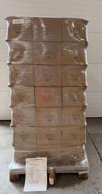 a large stack of boxes sitting on top of a pallet