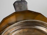 a close up of a metal object on a table