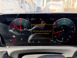 a car dashboard with a speedometer and gauges on it