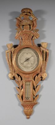 a clock that is hanging on the wall in the room