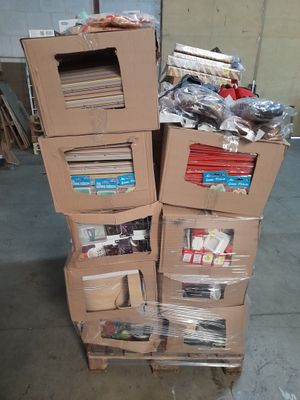 boxes stacked on top of each other in a warehouse