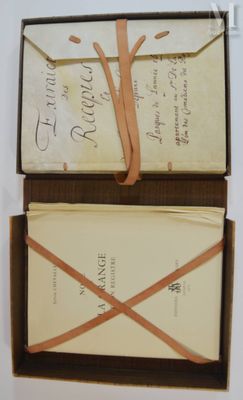 an open box with a note inside of it
