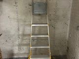 a ladder that is leaning against a wall in a room