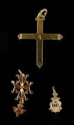 three gold crosses and a crown are shown on a black background