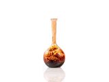 a vase that is sitting on a white surface