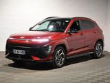 the red suv is parked in a large room with checkered flooring