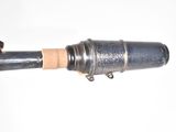 a metal pipe with a cork stopper attached to it