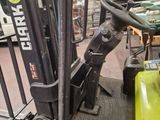 a forklift that is parked in a warehouse