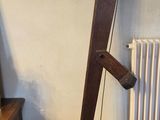 a picture of a room with a desk and a lamp