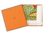 an orange box with a picture of a plant inside of it