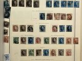 an open book with a bunch of different stamps on it