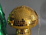 two christmas trees made out of disco glass and gold mirrors