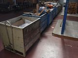 a large container sitting in the middle of a warehouse floor