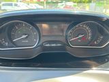 a close up of a car dashboard with a speedometer and gauges