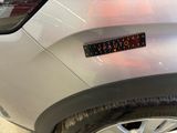 a close up of a sticker on the side of a car