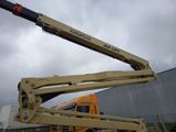 a crane that is sitting on top of a truck